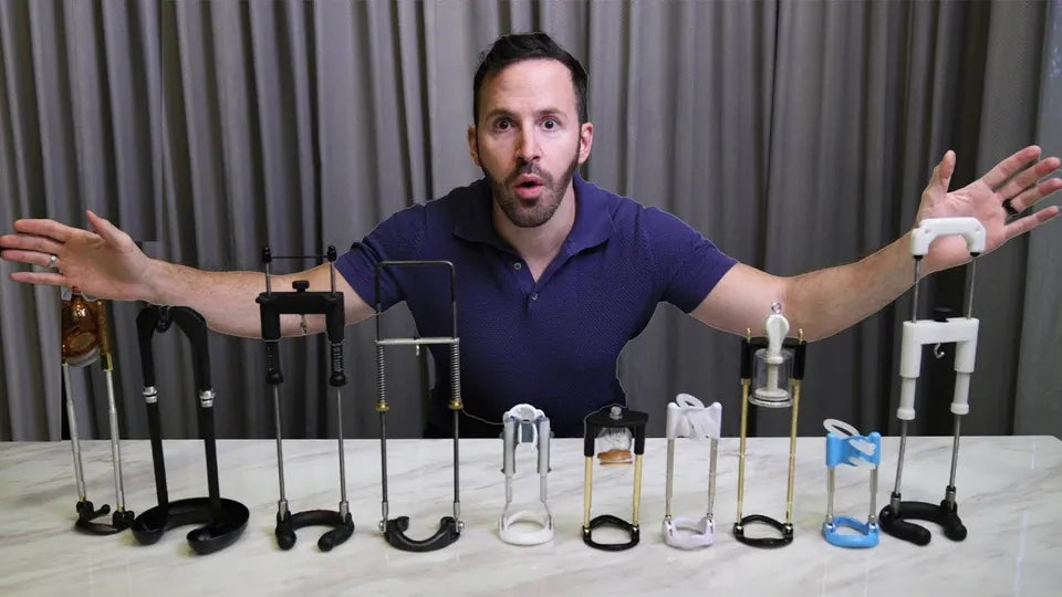 Baseem with a row of penis extenders he tested